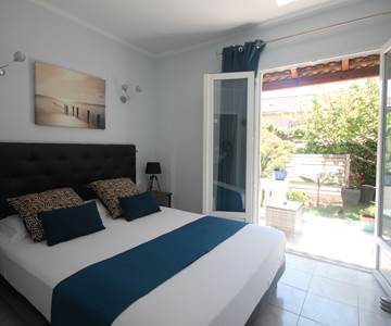 Chambre avec lit en 160 de l'appartement Lotu