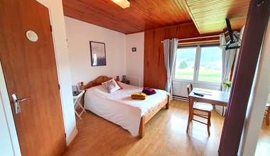 Chambre quadruple lynx vue jardin le grenier des Rousses