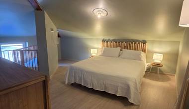 Chambre parentale avec lit bébé