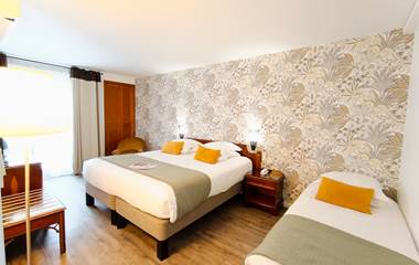 Chambre triple avec grand balcon