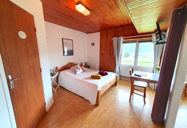 Chambre quadruple lynx vue jardin le grenier des Rousses