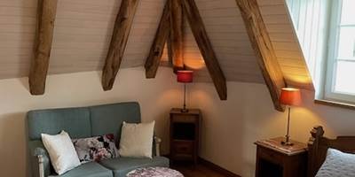 Chambre René - Le coin salon-presta