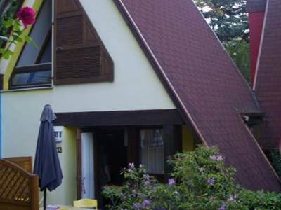 Pavillon Muscat en été avec sa terrasse de plain-pied