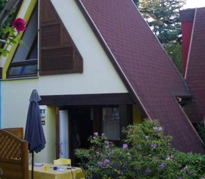 Pavillon Muscat en été avec sa terrasse de plain-pied