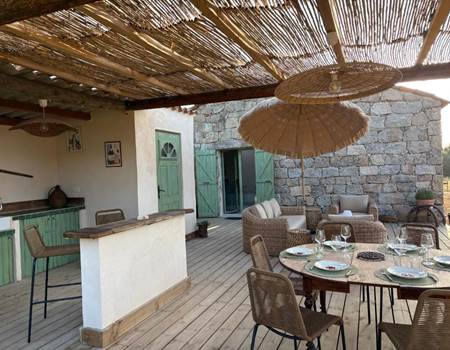 Terrasse rustique avec pergola