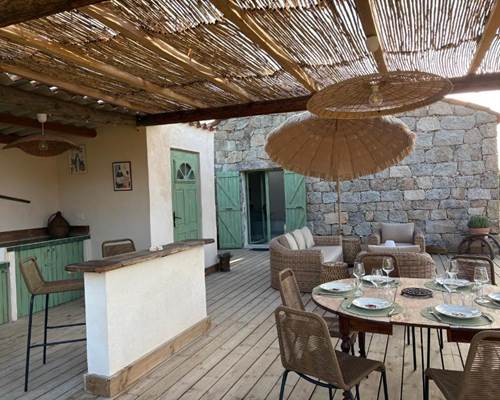 Terrasse rustique avec pergola