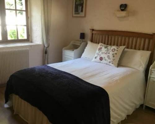 La chambre double avec lit 180cm