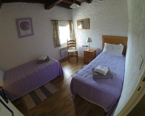 Chambre deux lits simples