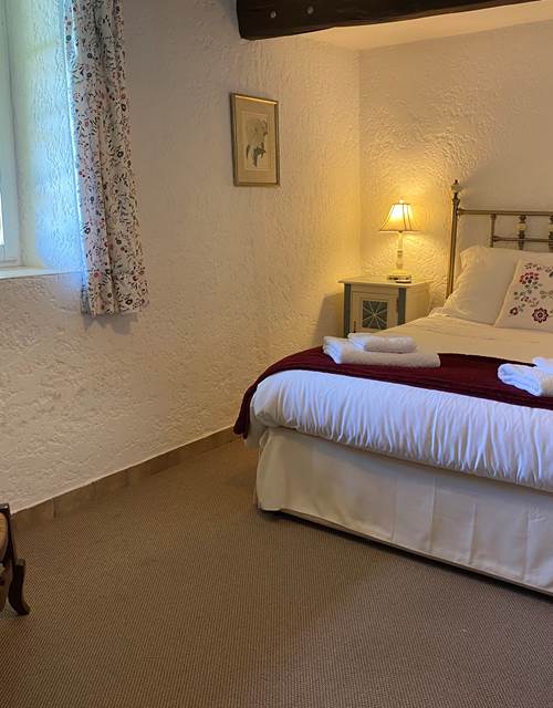 La chambre avec lit 150 cm