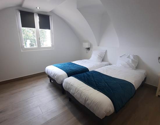 Chambre avec 2 lits simples