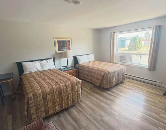 Chambre idéale pour familles avec 2 lits doubles
