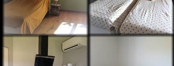 Appartement T3 composé de deux chambres indépendantes, chacune avec sa salle d’eau et WC, reliées par un espace commun avec cuisine et coin repas.