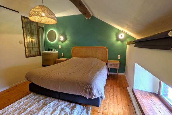 Bright queen bedroom with peaceful countryside atmosphere