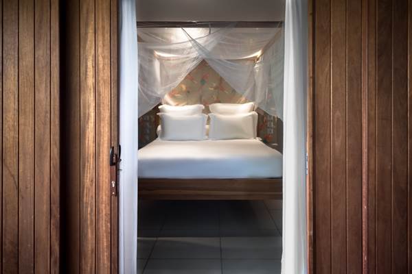 <img src="chemin-de-l-image.jpg" alt="Literie de qualité dans la suite Carriacou à l'hôtel La Maison de Clémentine, Fort-de-France, Martinique" />