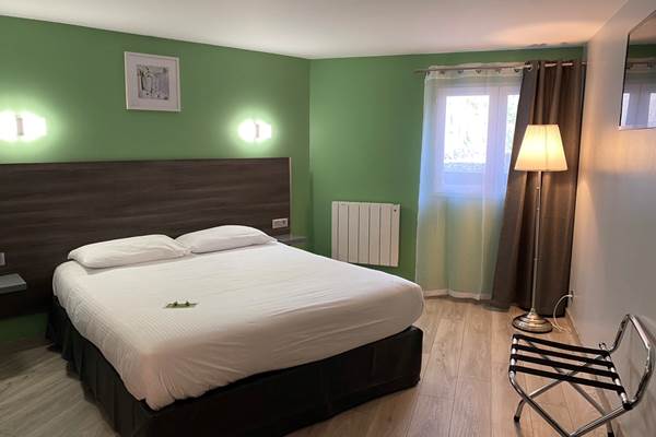 Chambre Grand lit double Confort - Vue sur Jardin