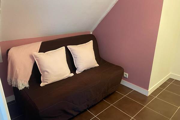 Alcove à l'étage avec canapé convertible