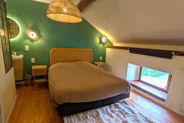 Comfortable en-suite bedroom with queen size bed in countryside holiday home