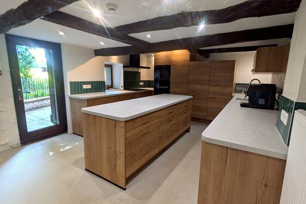 Modern kitchen with two refrigerators designed for large family gatherings