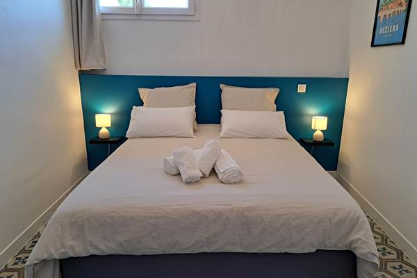 Chambre bleue du gîte Le Ramonetage.