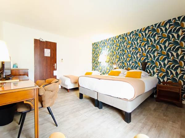 Chambre triple avec grand balcon