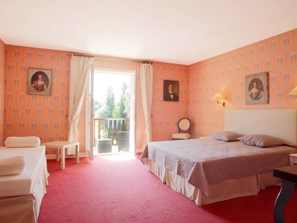 Chambre quadruple gentilhommière avec balcon