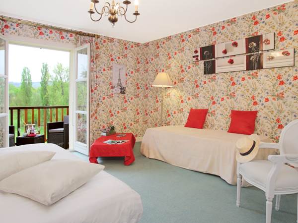Chambre quadruple Coquelicot  Junior suite 26 avec lit gigogne et balcon - PMR