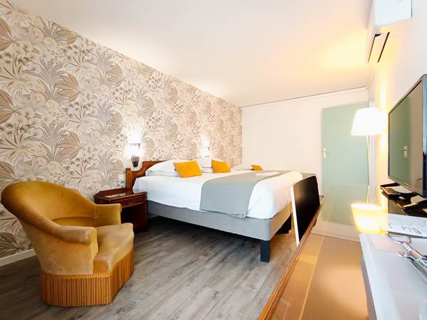 Chambre triple avec grand balcon