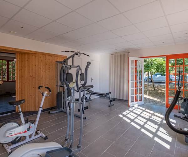 Salle de sport avec sauna