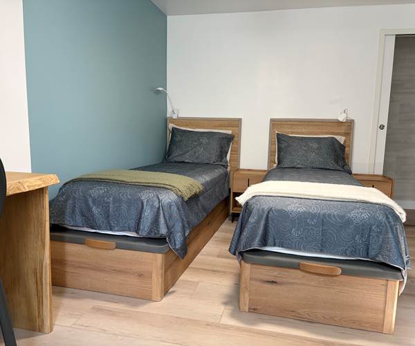 Chambre bleue lits séparés