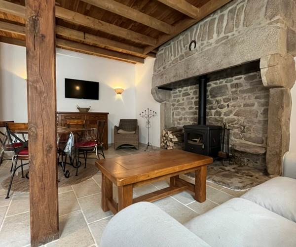 Coin canapé gîte 4 places - Gîte Vassivière Le Fer A Cheval