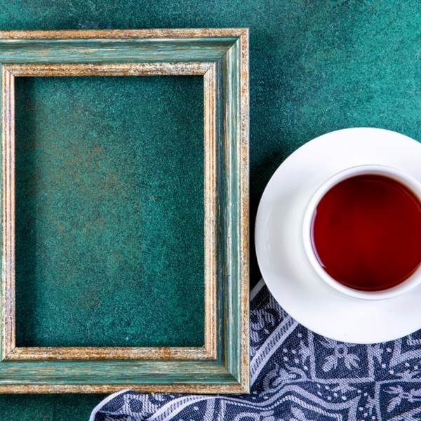 top-view-copy-space-green-gold-frame-with-cup-tea-kitchen-towel-green-photo-gallery