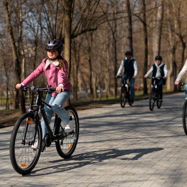 full-shot-family-cycling-together (1)-photo-gallery