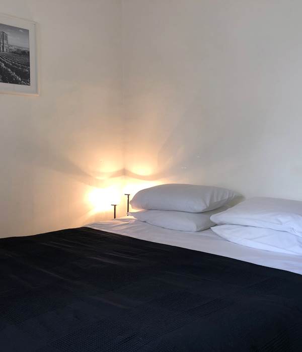 Le lit Queen size avec sa literie haute résilience