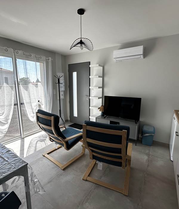 Logement 1 LE MAINE LOREVA CONSTANT vue salon 2