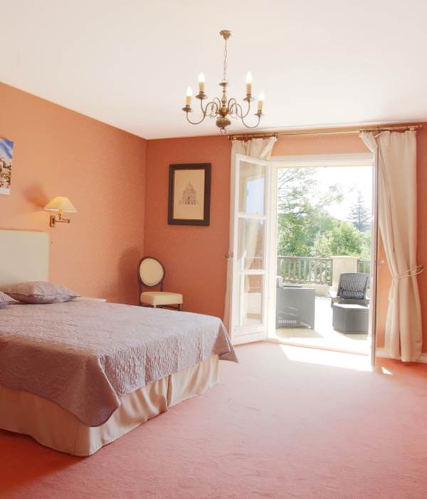 Chambre quadruple gentilhommière avec balcon ou terrasse partagée
