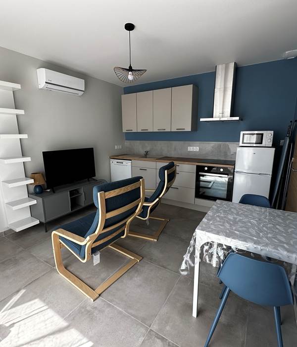 Logement 1 LE MAINE LOREVA CONSTANT vue salon coin repas