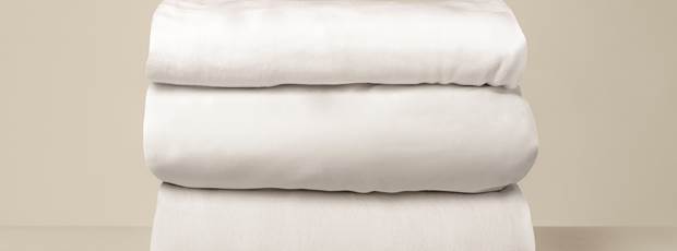 linge-lit-blanc-empile