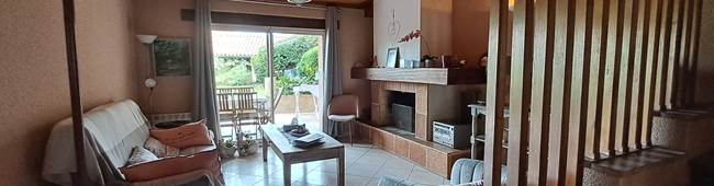 Gite de la Sauvetat, salon avec cheminée