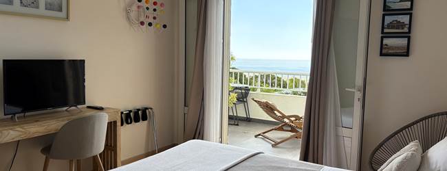 Chambre Galabé et sa terrasse vue mer, lit Queen-size et climatisation