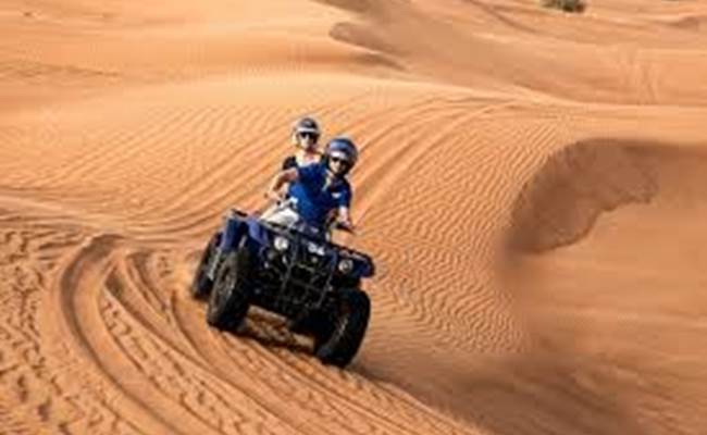 Vers le bivouac, en quad au milieu des dunes