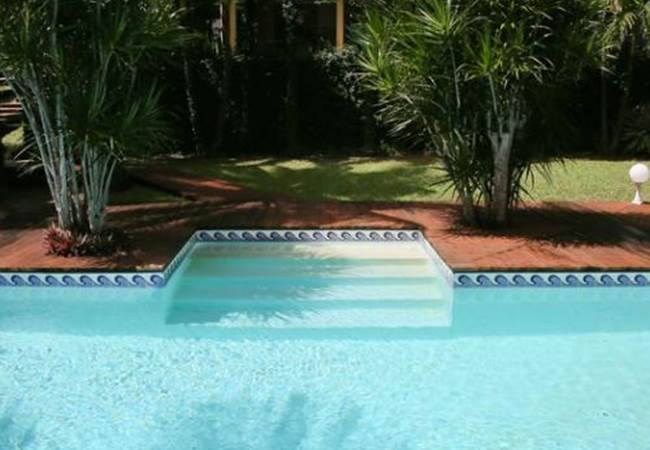 Soleil-palmiers-piscine-des-gites-l-or-des-caraibes