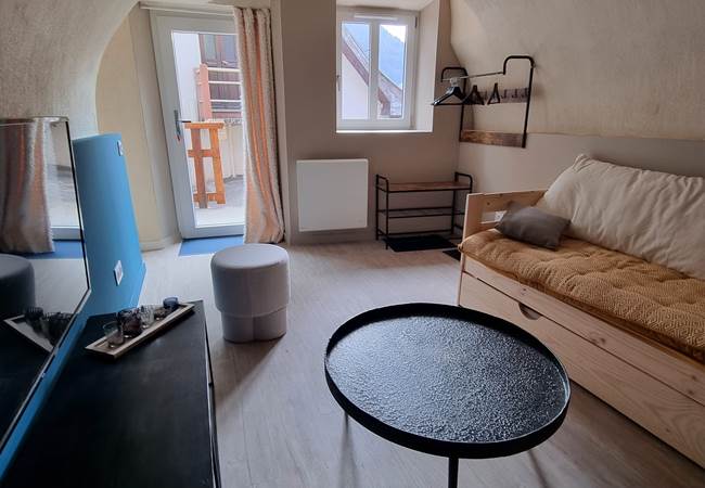 SALON AVEC BANQUETTE LITS