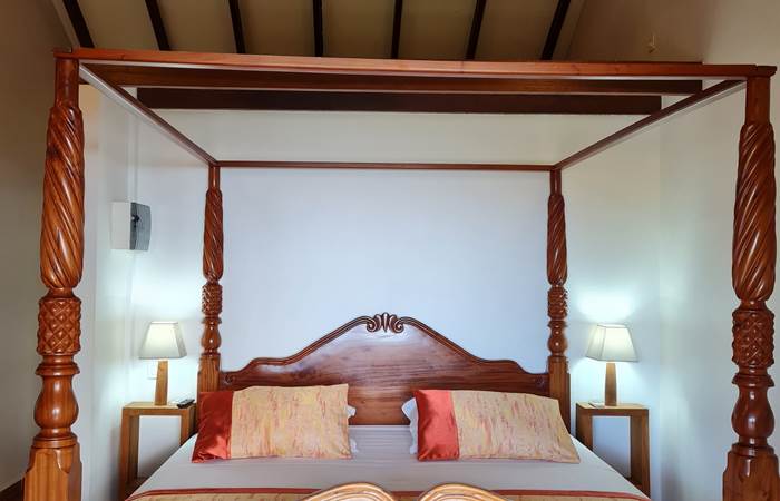 Chambre HIBISCUS, lit à Baldaquin