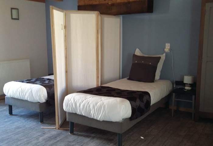 la chambre Alsace Lits simples avec paravent
