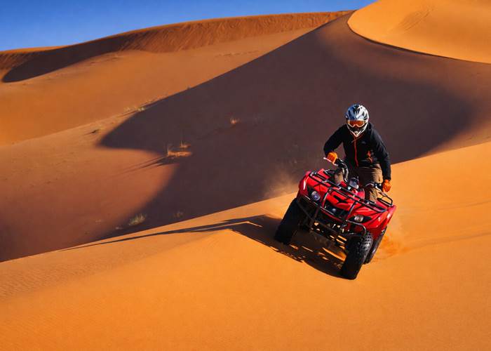Quad dans les dunes