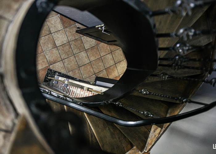 Un escalier tournant plus que centenaire