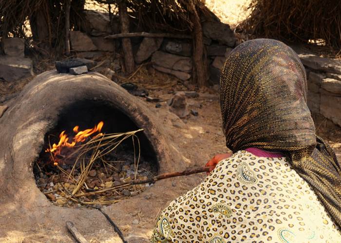 Préparation des repas selon les traditions dans le campement