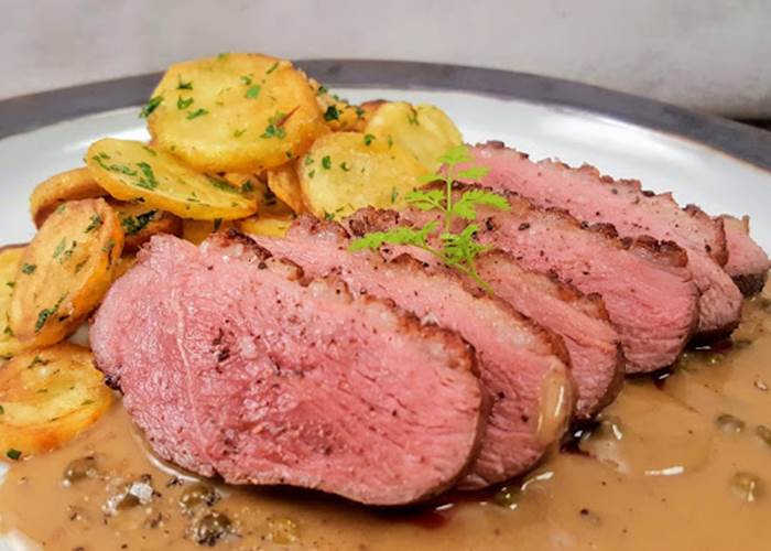 Magret de canard en sauce