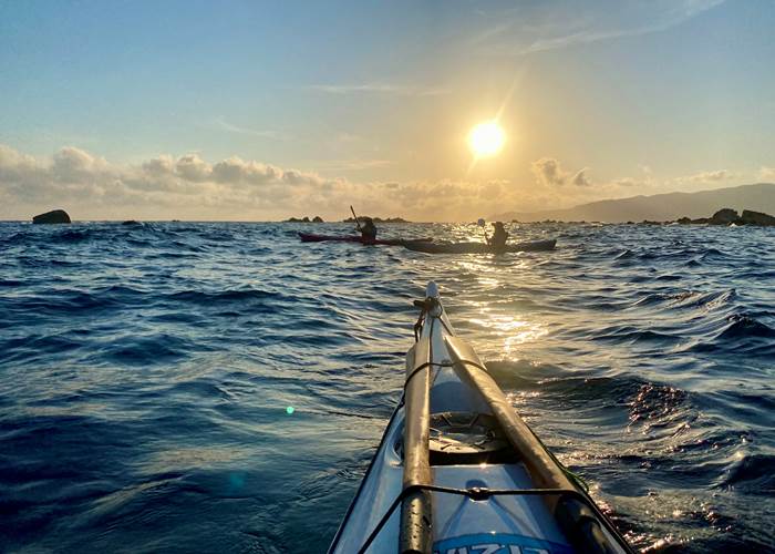 Abbartello kayak coucher de soleil à la Punta de Porto Pollo
