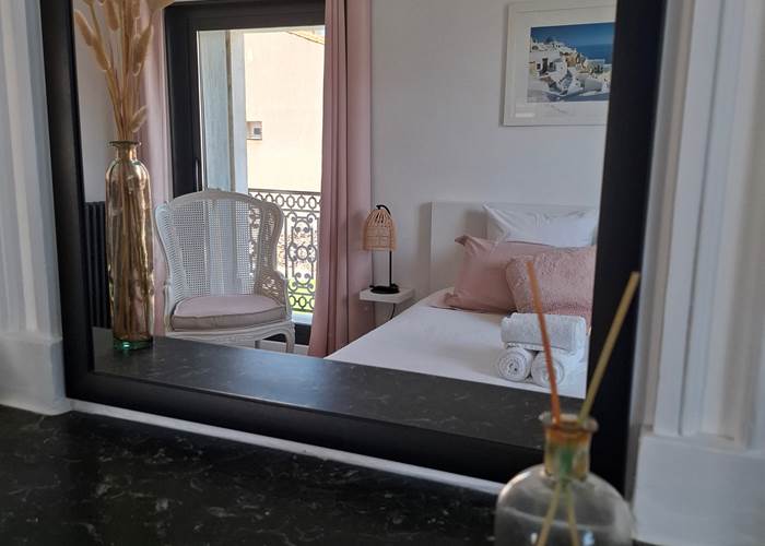 Chambre Pastelle des Gîtes de Monte Blanco, décoration soignée et ambiance chaleureuse dans l'Hérault.
